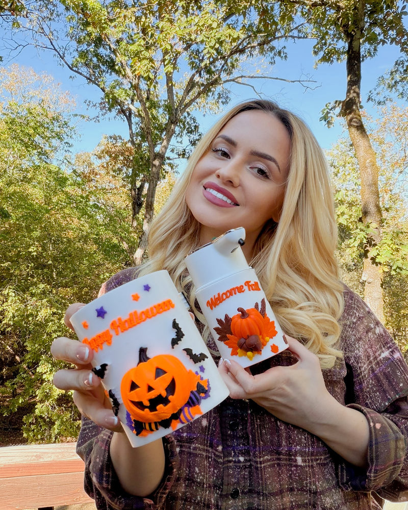Happy Halloween and Welcome Fall automatic soap dispensers held outdoors